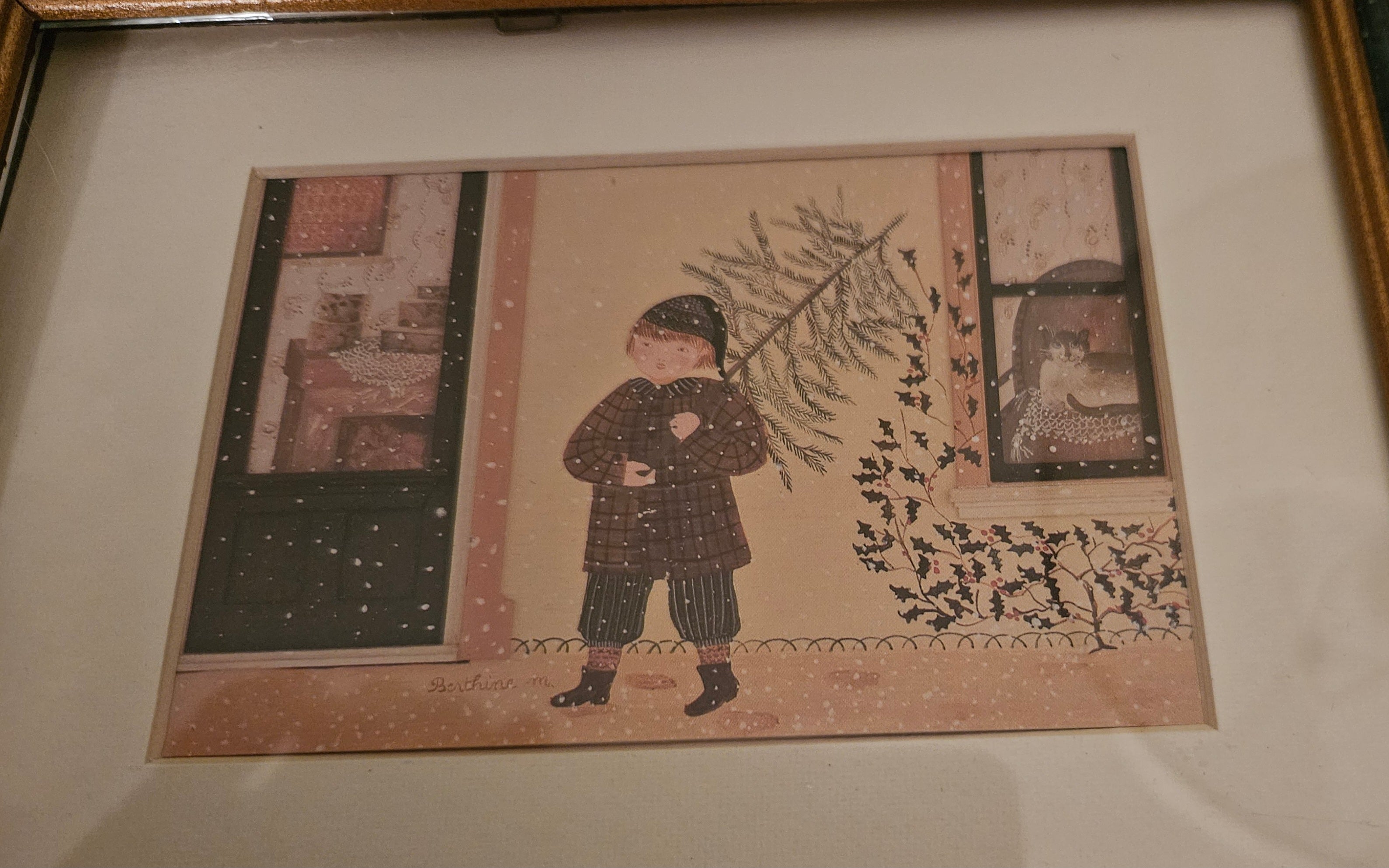 Framed Print of Boy Carrying a Tree as Snow Falls