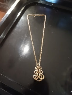 M.C.M.Gld Tone Swirl Necklace