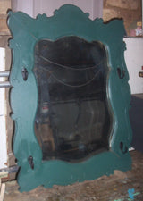 Beveled mirror w/ hooks, circa 1900.