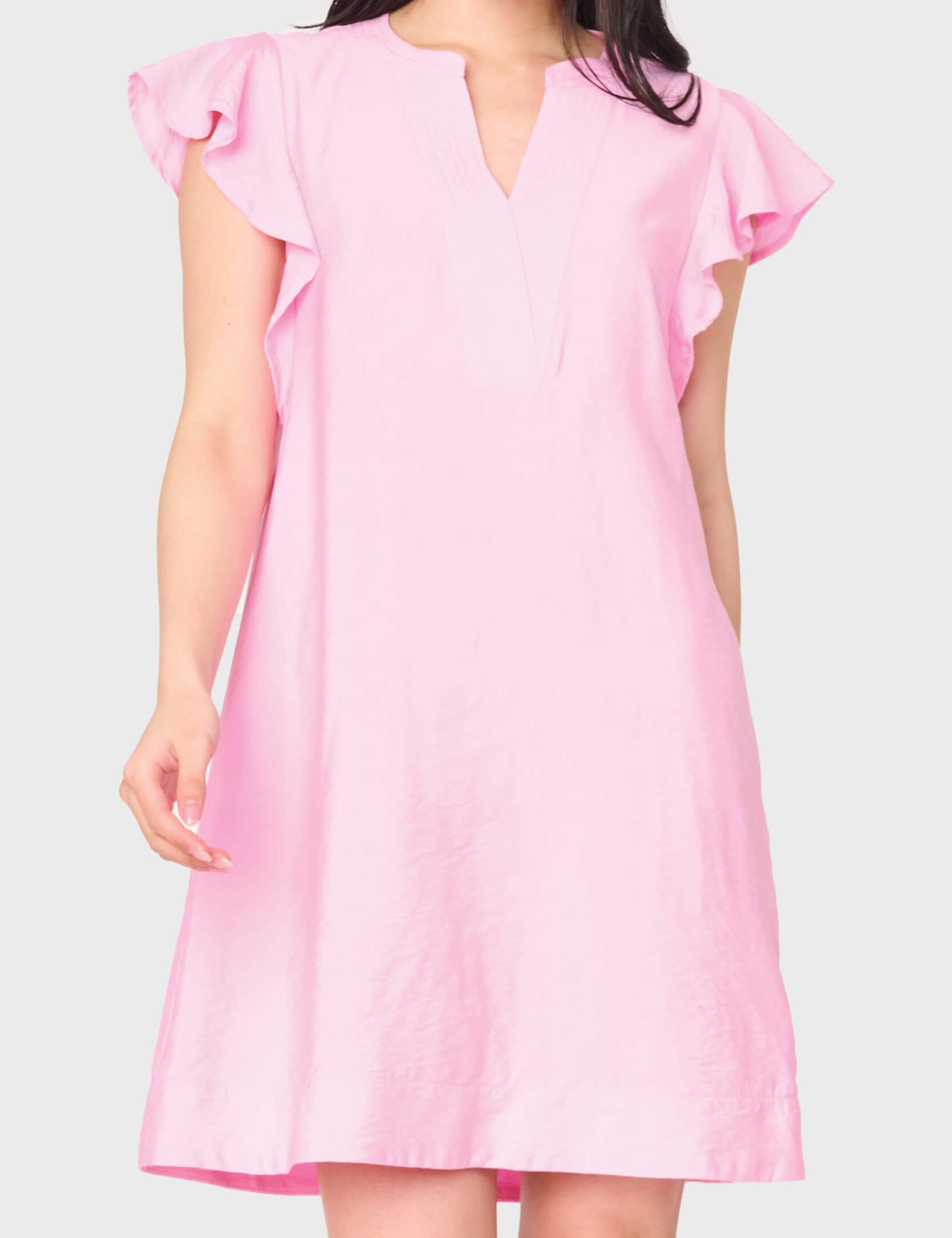 Pink flutter sleeve notch neck shift dress with side pockets and relaxed fit | JSQ Mercantile – a women’s boutique and gift shop in La Grange, IL.