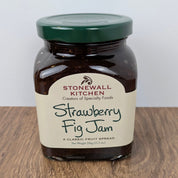 Stonewall Kitchen Gourmet Strawberry Fig Jam combines sweet strawberries with earthy figs for a rich, smooth spread. Perfect for toast, pastries, or cheese boards. Available at JSQ Mercantile – Women’s Boutique & Gift Shop in La Grange, IL.