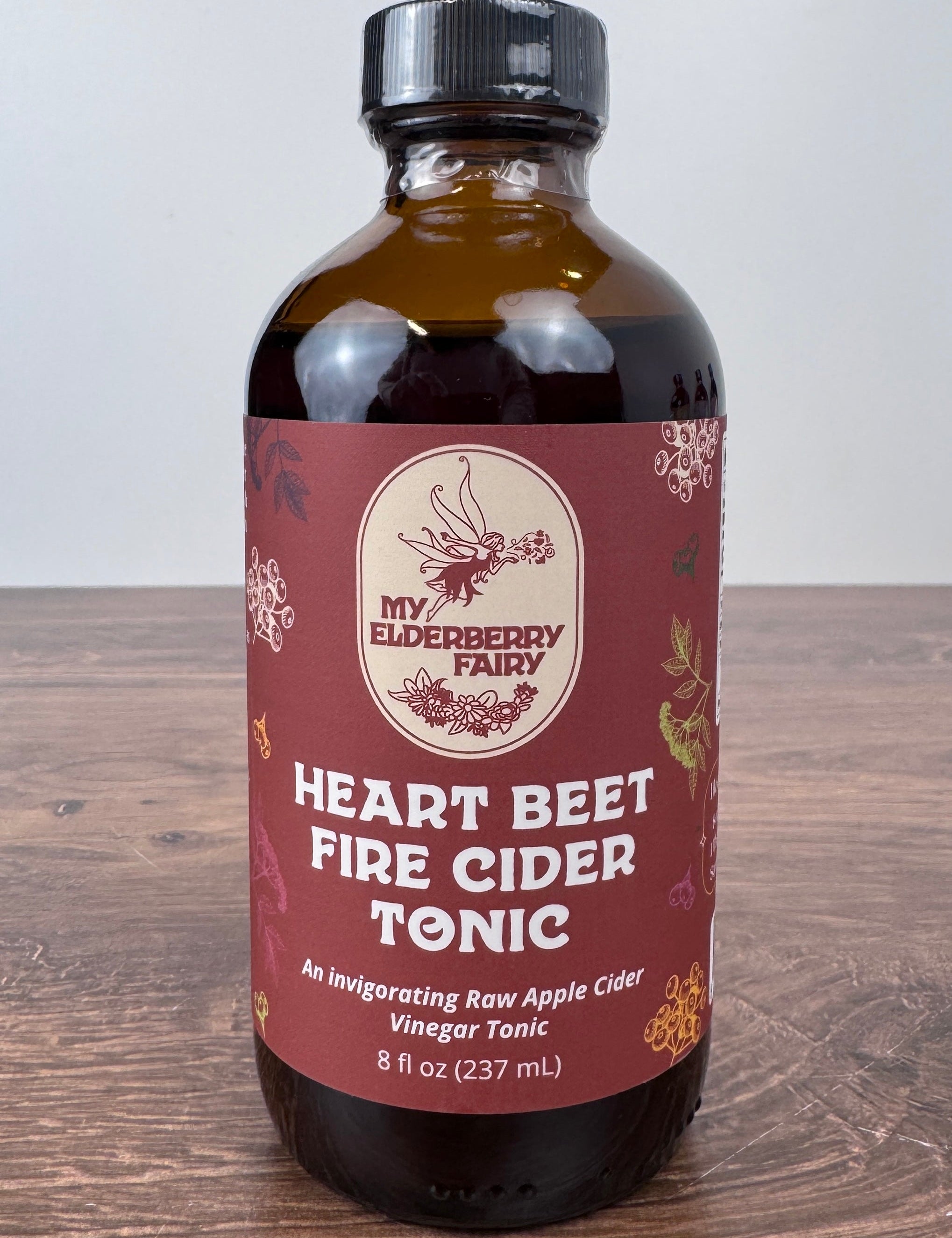 Heart Beet Fire Cider Tonic in 8 oz glass bottle with herbal apple cider vinegar blend for seasonal wellness and circulation support – JSQ Mercantile – a women’s boutique and gift shop in La Grange, IL.