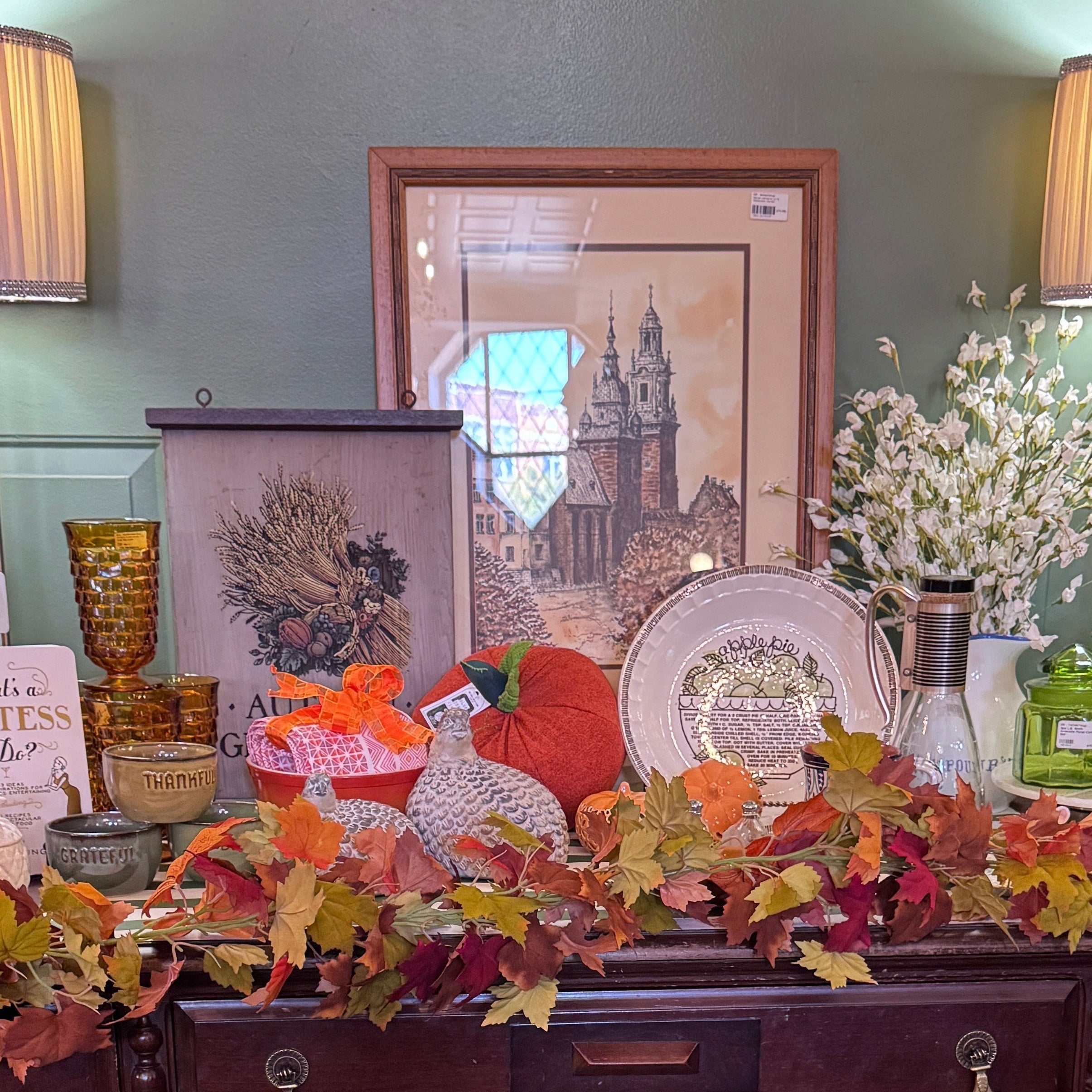 Mix of vintage and new fall decor on vintage wooden buffet | Jackson Square Collective