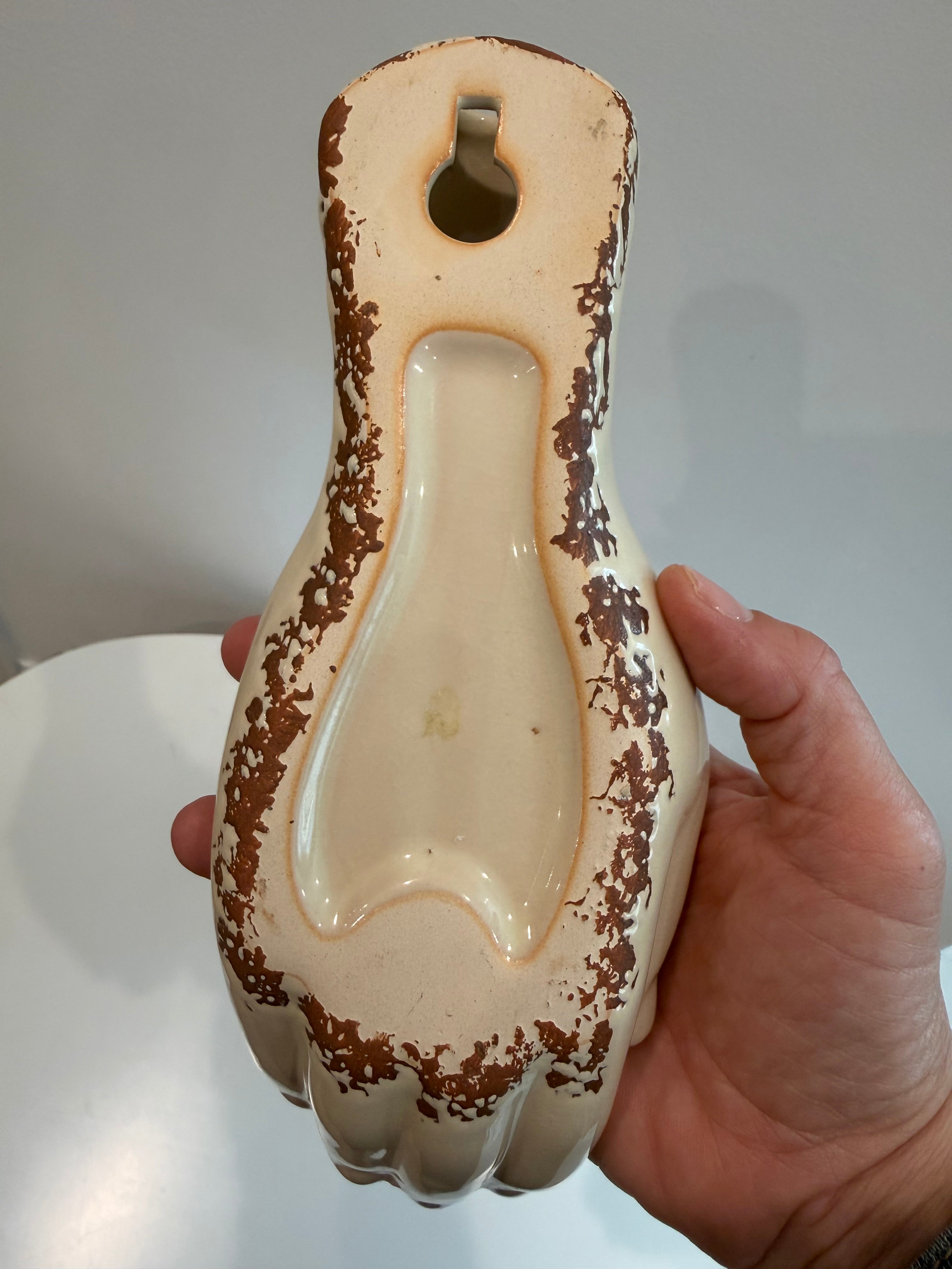 Hanging porcelain hand- wall pocket or tabletop decor.
