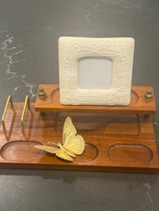 Fabric covered picture frame with lace detail