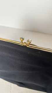 Vintage black lined clutch with kiss clasp