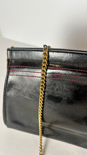Black glossy leather clutch