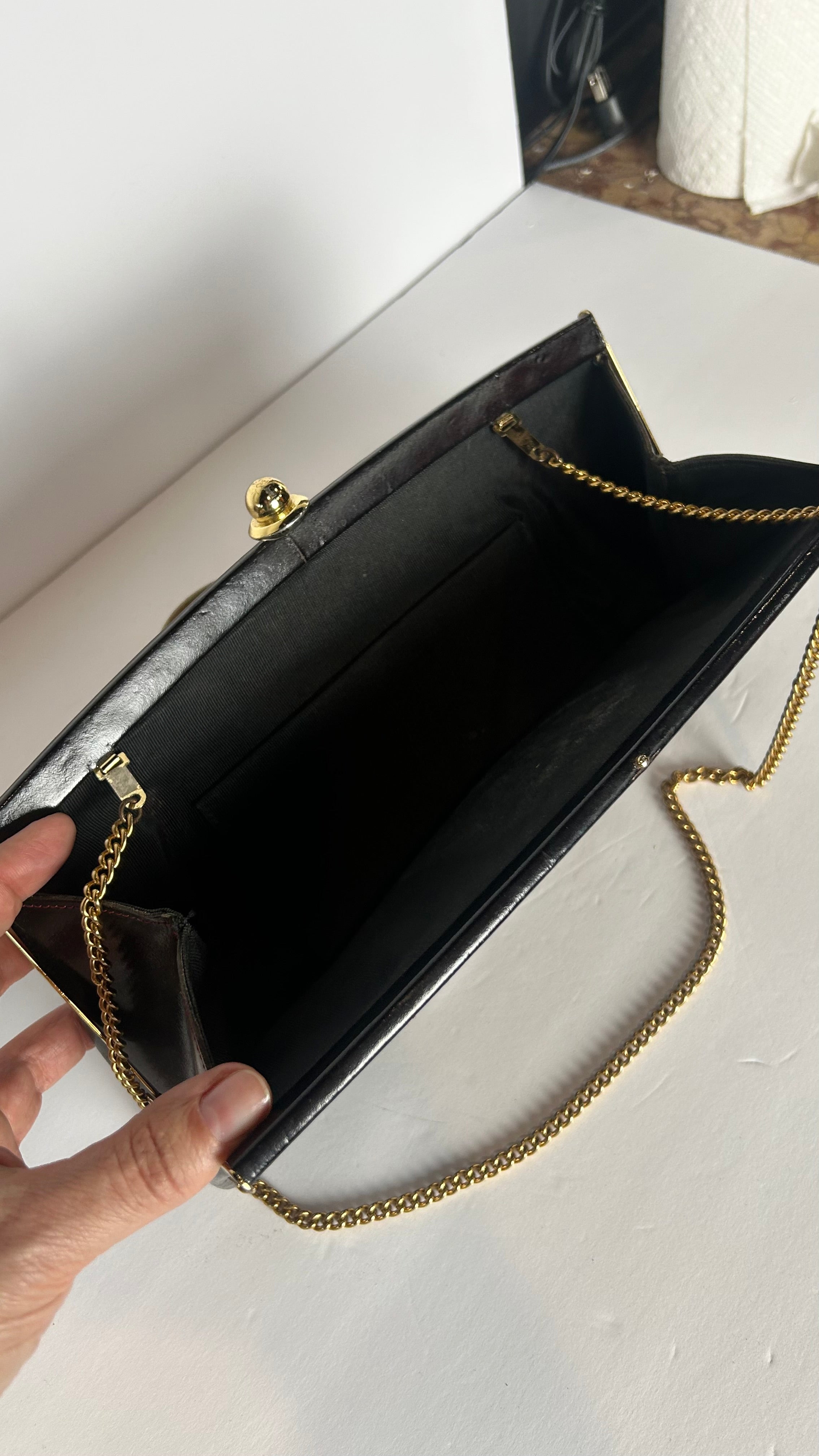 Black glossy leather clutch