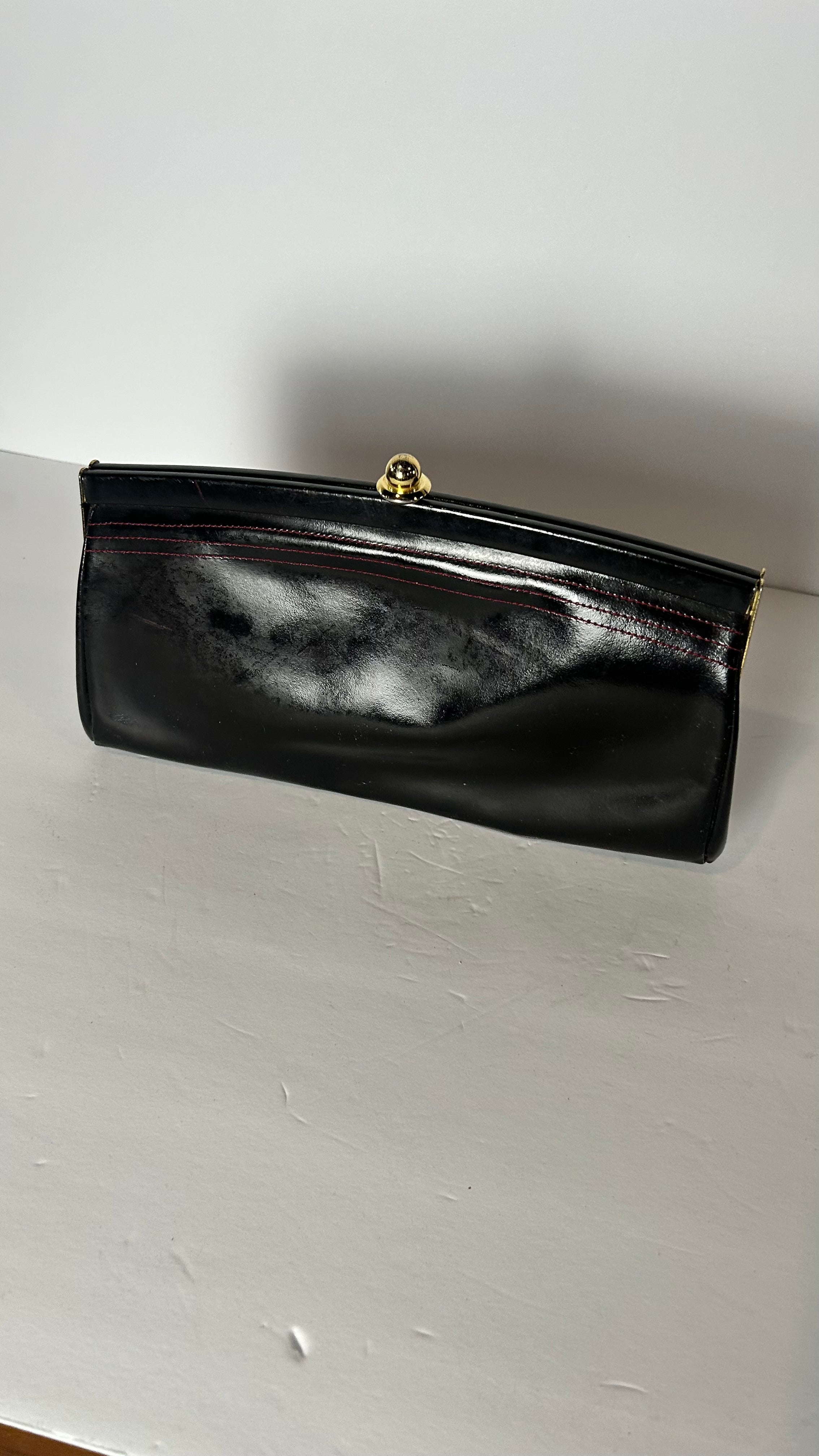 Black glossy leather clutch