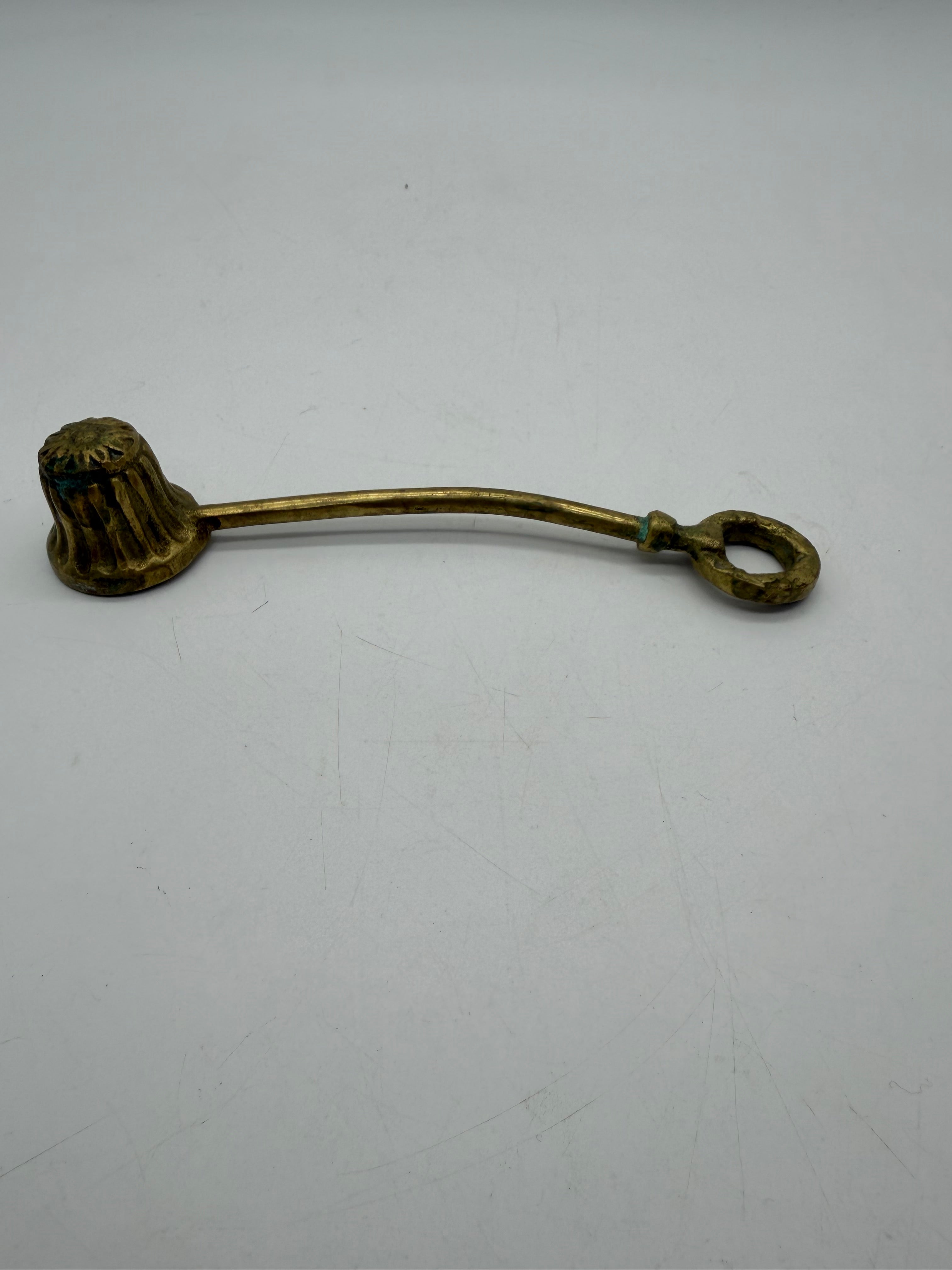6” brass candle snuffer flower motif