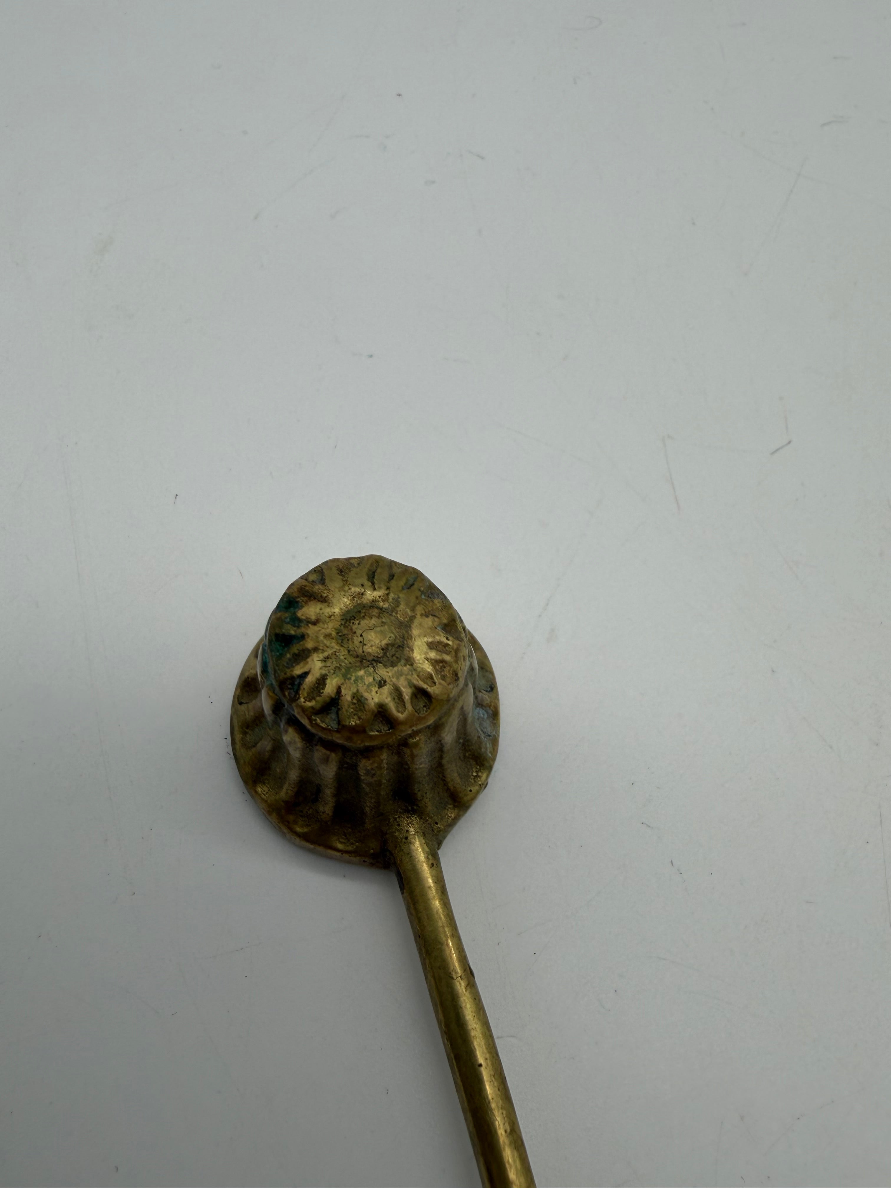 6” brass candle snuffer flower motif