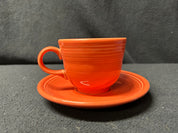 Light Orange Fiestaware Tea-cup and Saucer Set