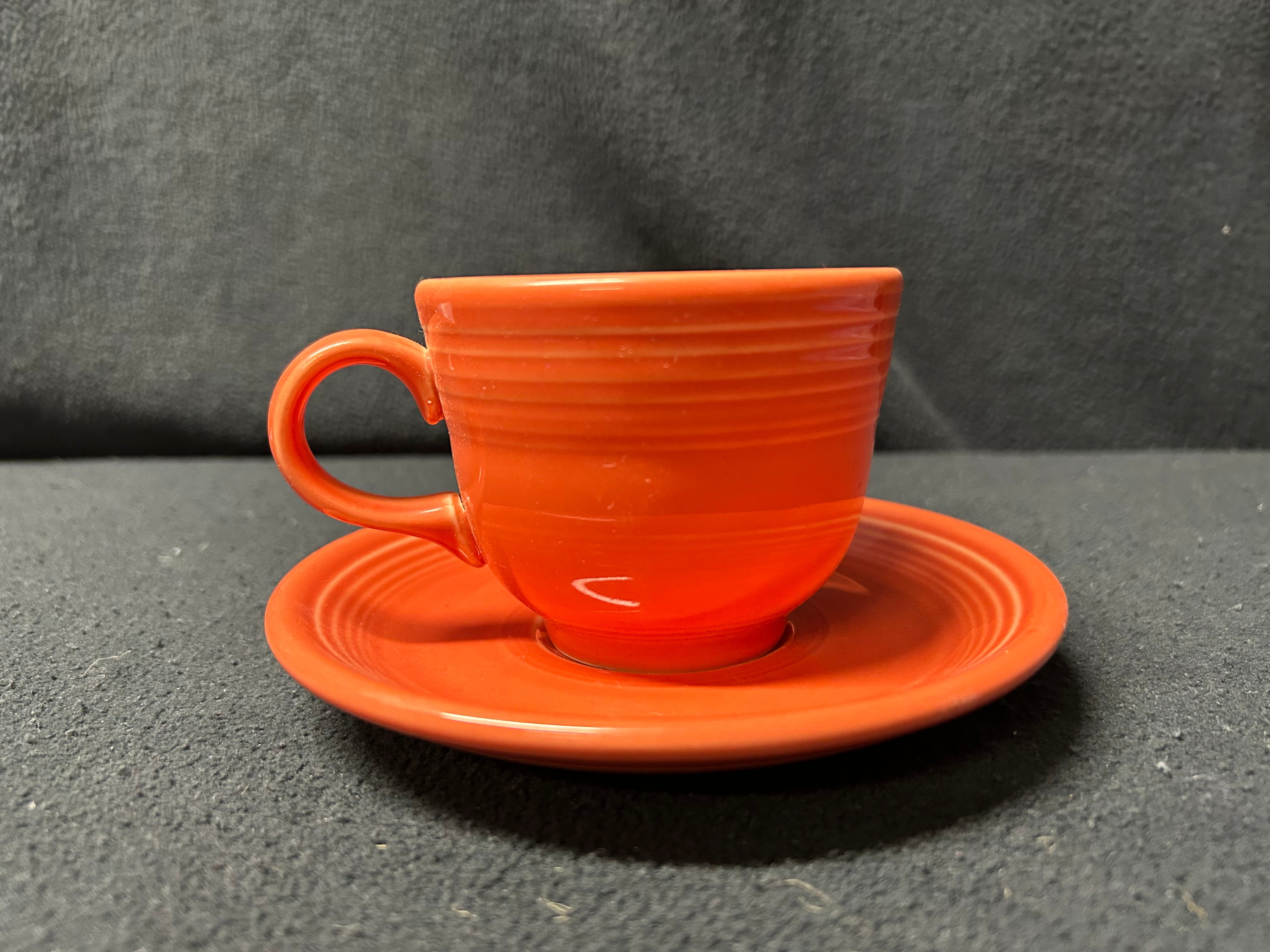 Light Orange Fiestaware Tea-cup and Saucer Set