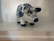 blue and white floral ceramic pig