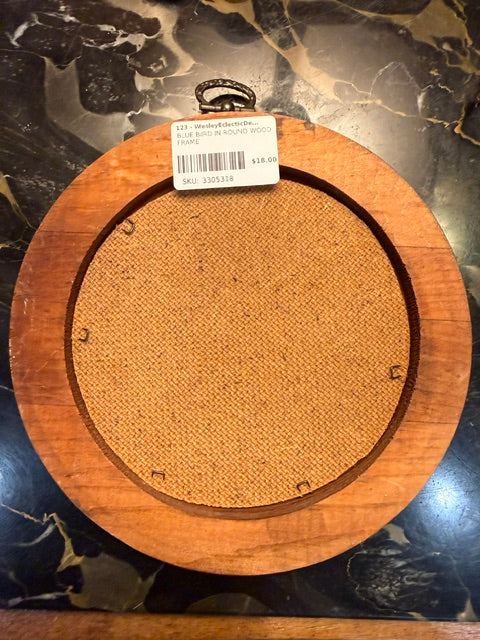 BLUE BIRD IN ROUND WOOD FRAME