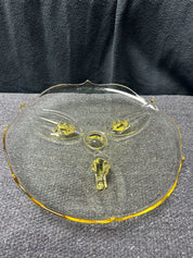 Yellow plate with three legs