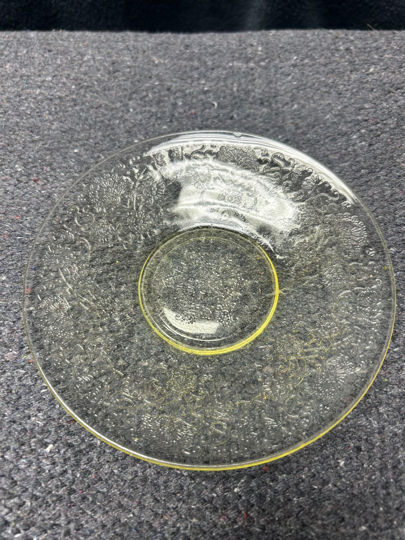 small yellow plate with design