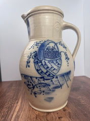 Vintage Salmon Falls Stoneware Pitcher with Blue Basket Motif