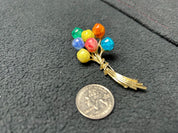 7 balloon stones pin