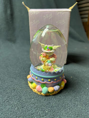 Easter egg-shaped glass water globe
