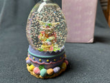 Easter egg-shaped glass water globe