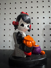 Not-So-Precious-Moments figurine
