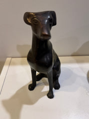 Metal Black Dog Sitting Up