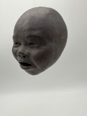 5” studio pottery hanging doll head dark brown
