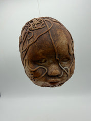 5” studio pottery doll head squiggle design hanging