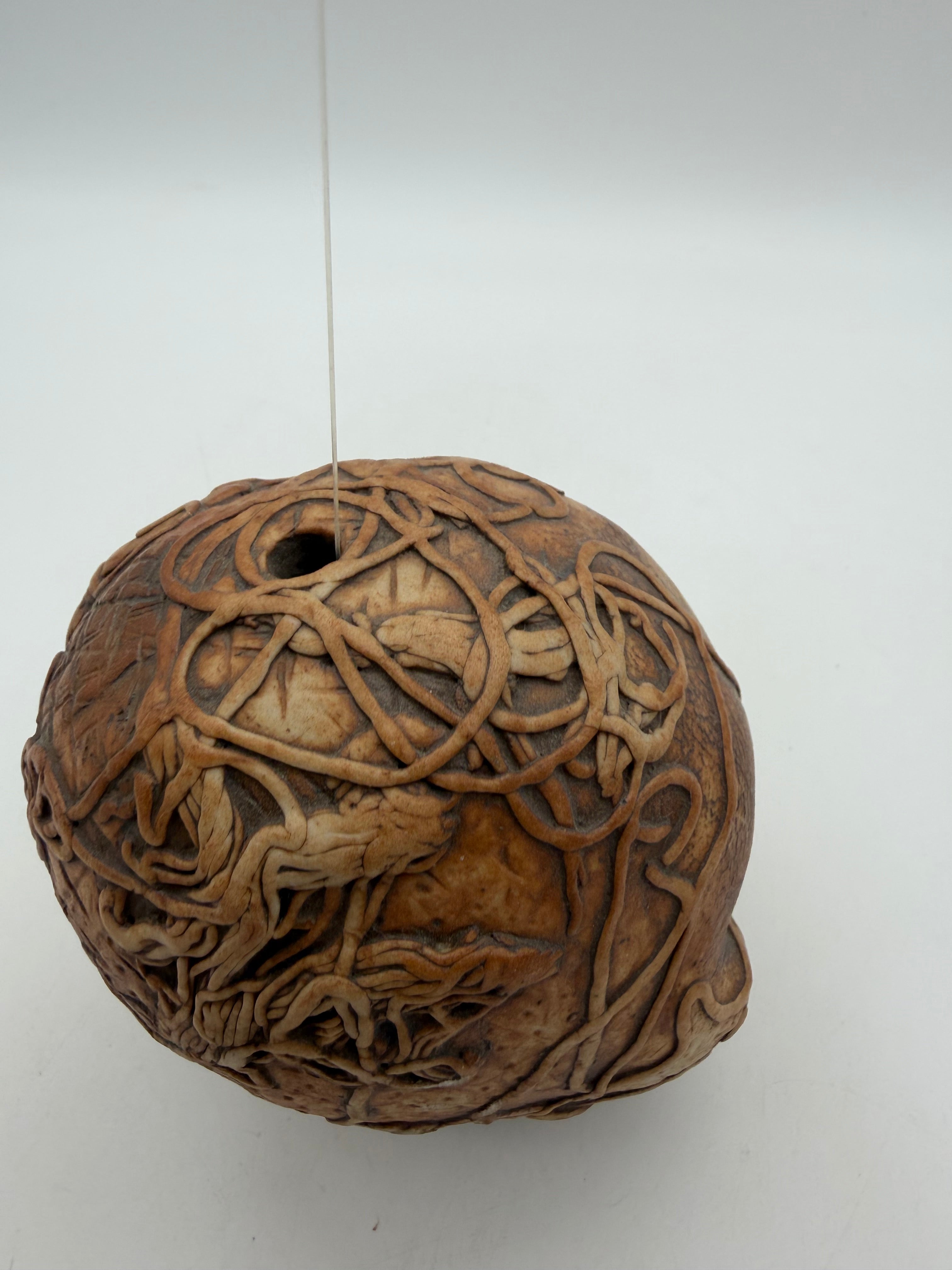 5” studio pottery doll head squiggle design hanging