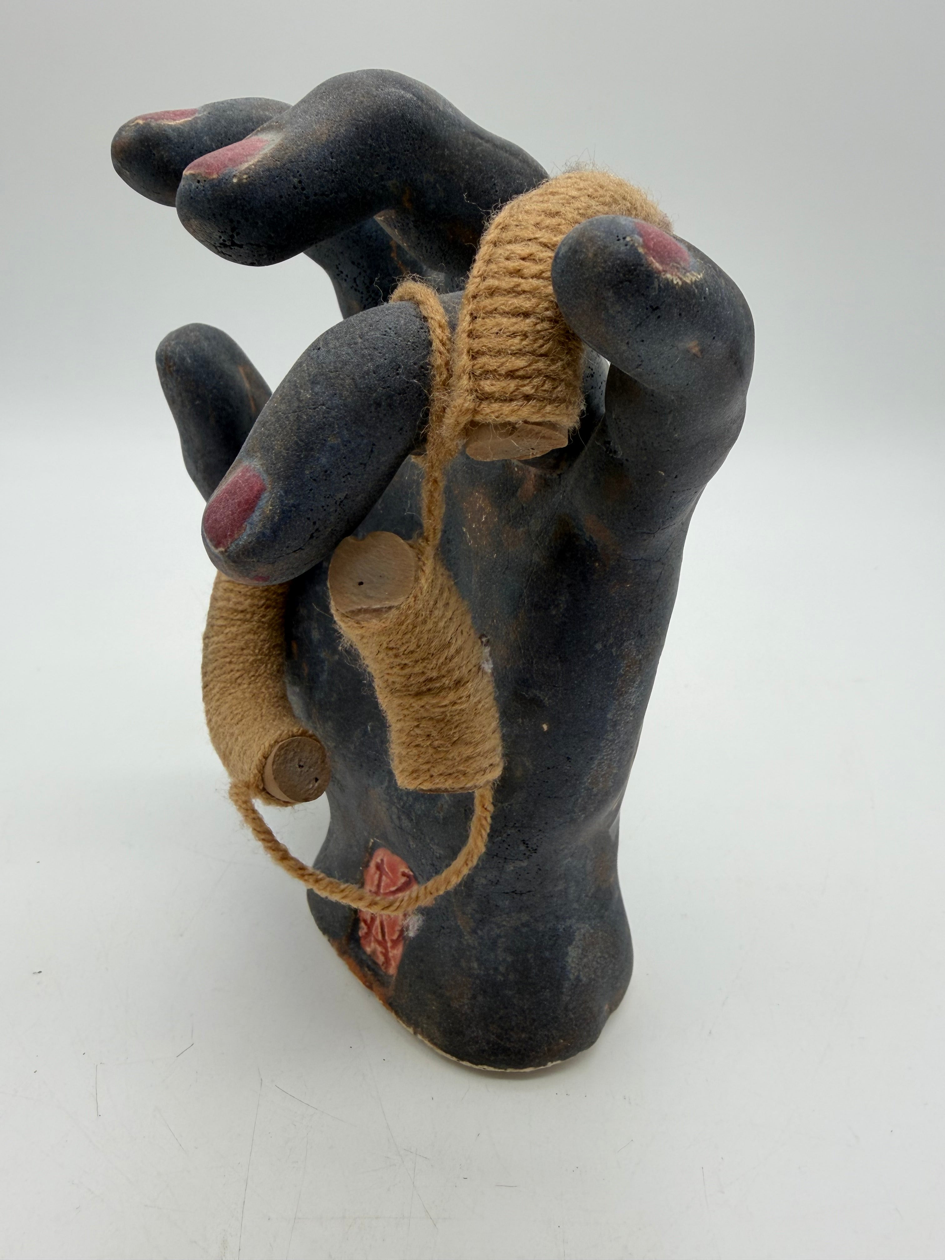 7.5” art pottery Hand sculpture black