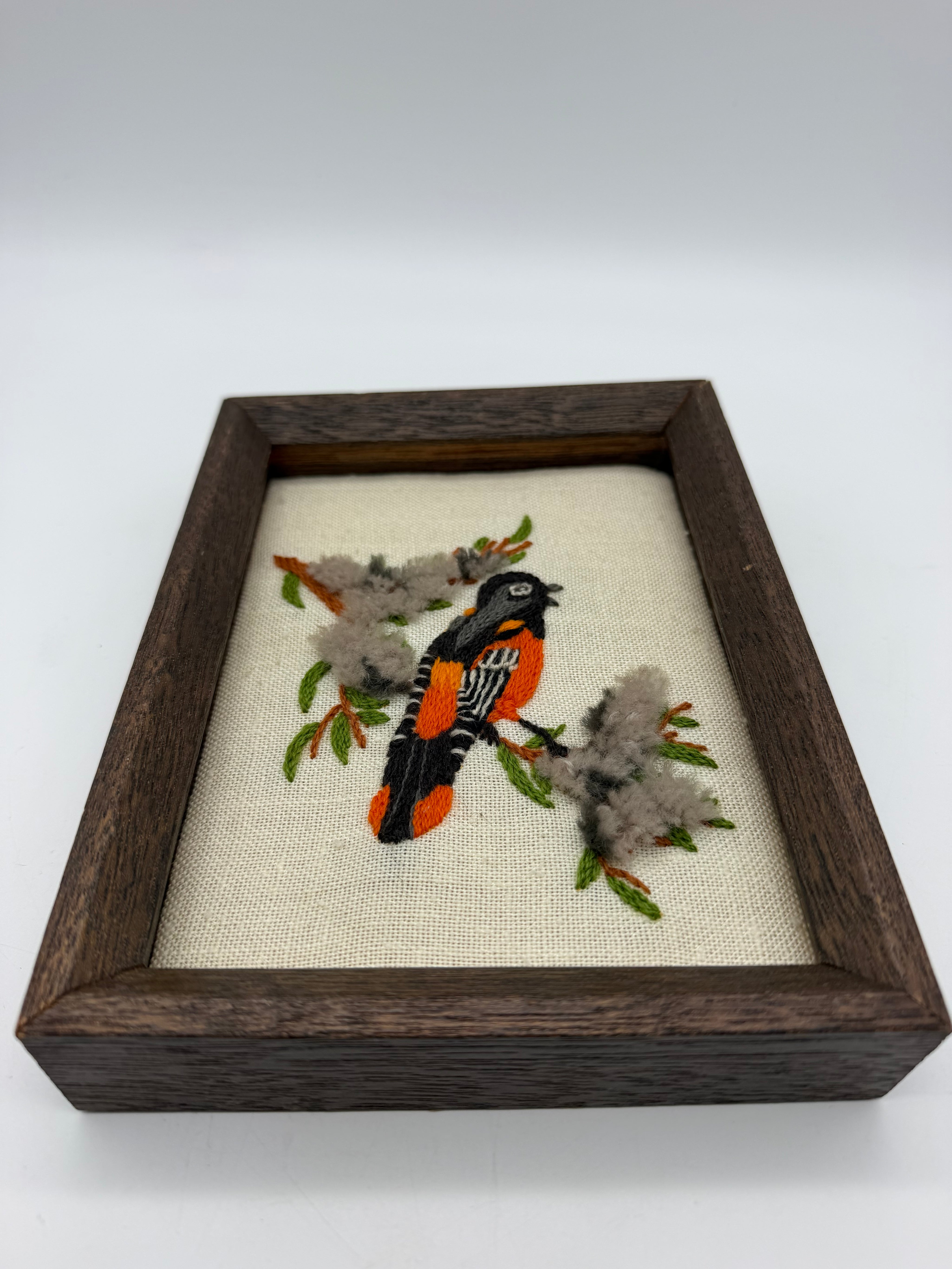 8” Embroidered Bird black orange wood framed