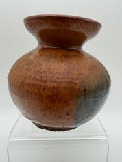 5” bulbous orange and black studio pottery vase