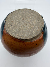 5” bulbous orange and black studio pottery vase