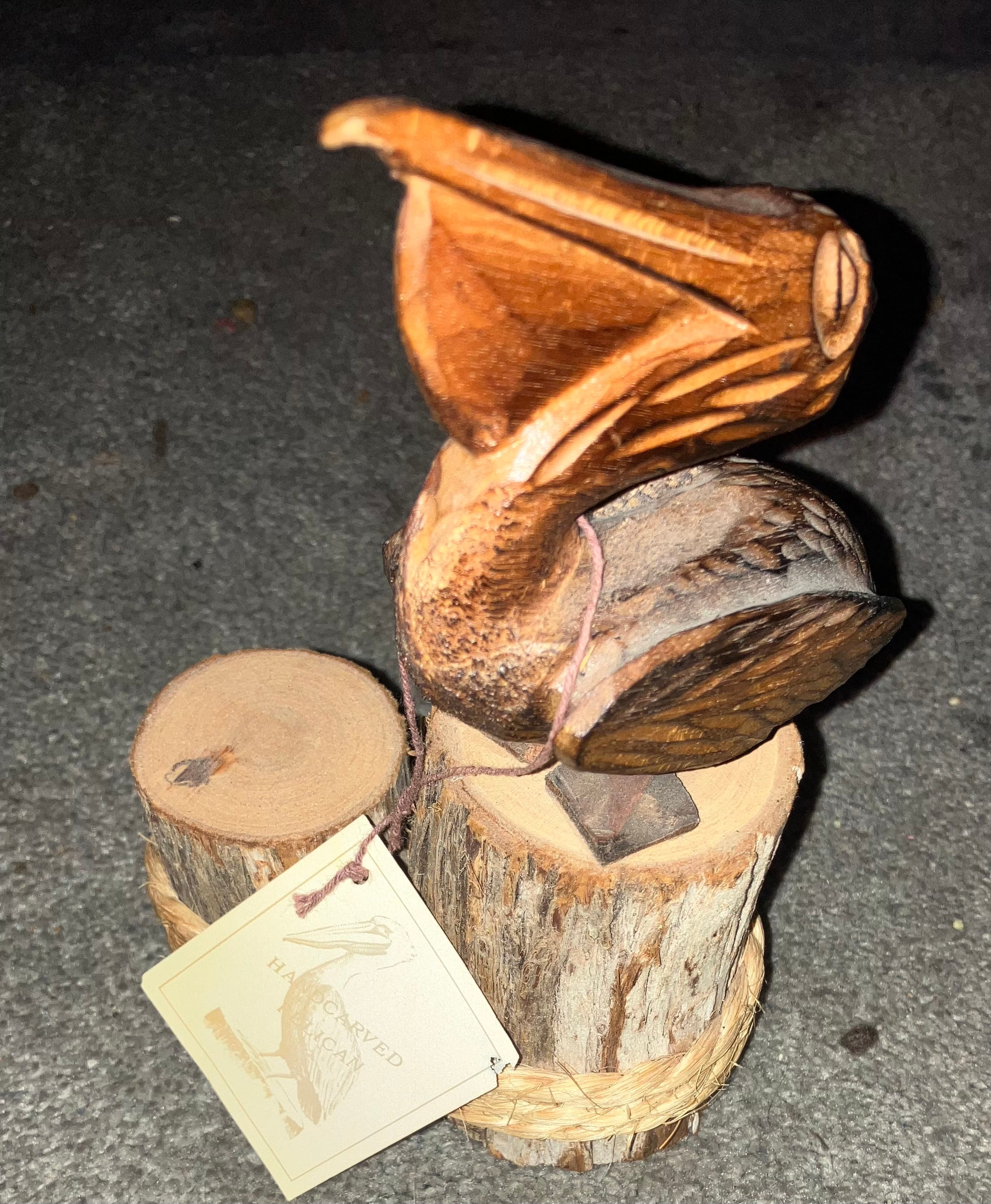 Hand-Carved Pelican on Pilings