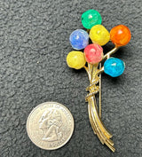 7 balloon stones pin