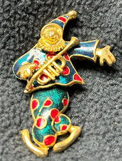 Red/green jester pin