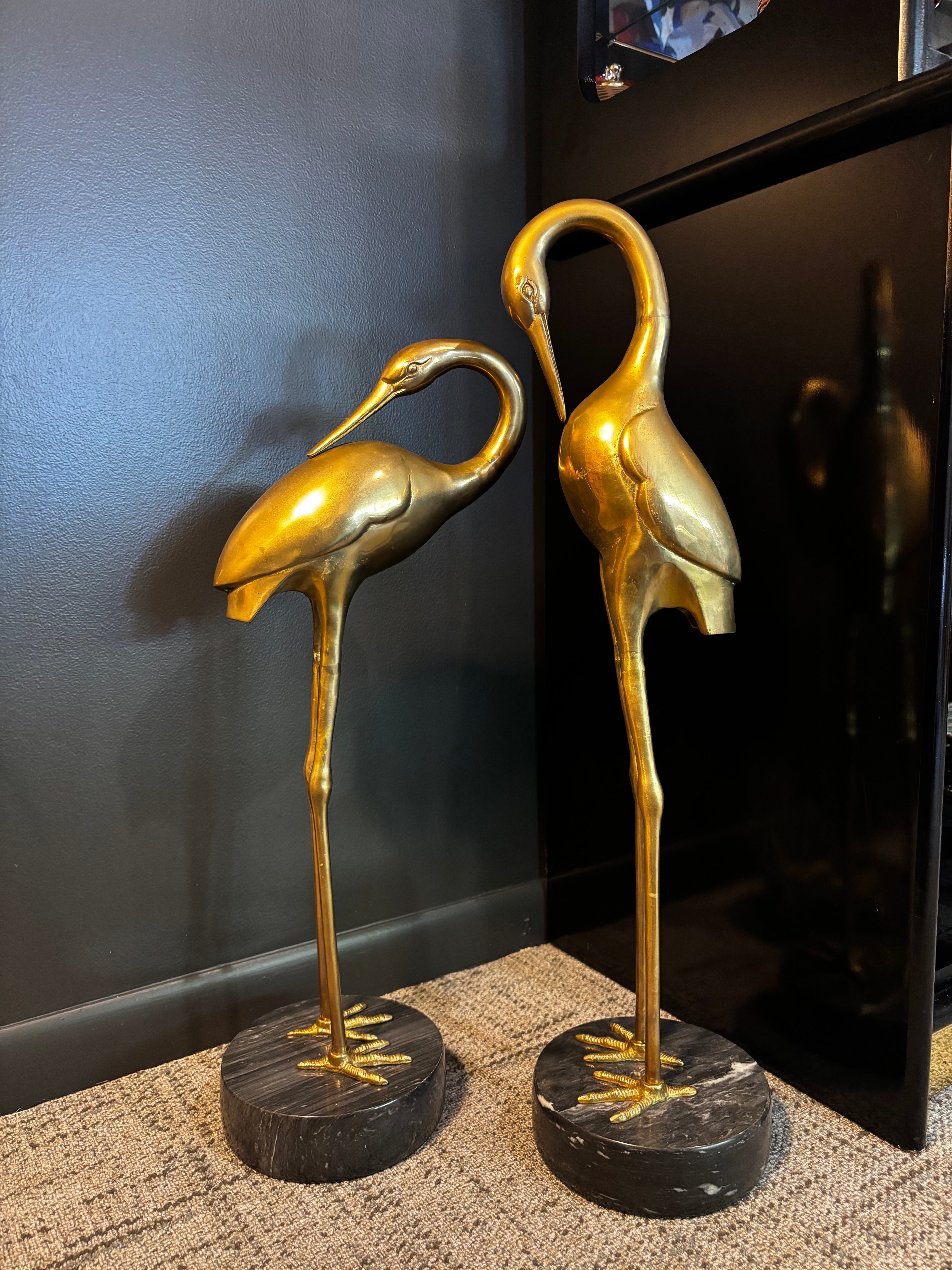 vintage brass crane sculpture with marble base