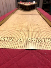 "Bowl A Strike" by T. Cohn