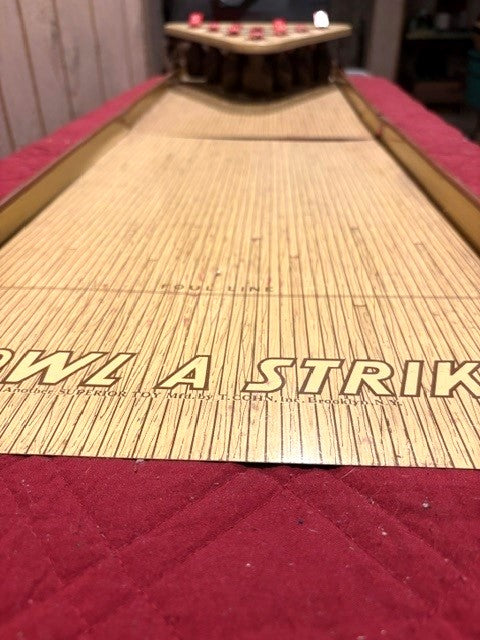 "Bowl A Strike" by T. Cohn