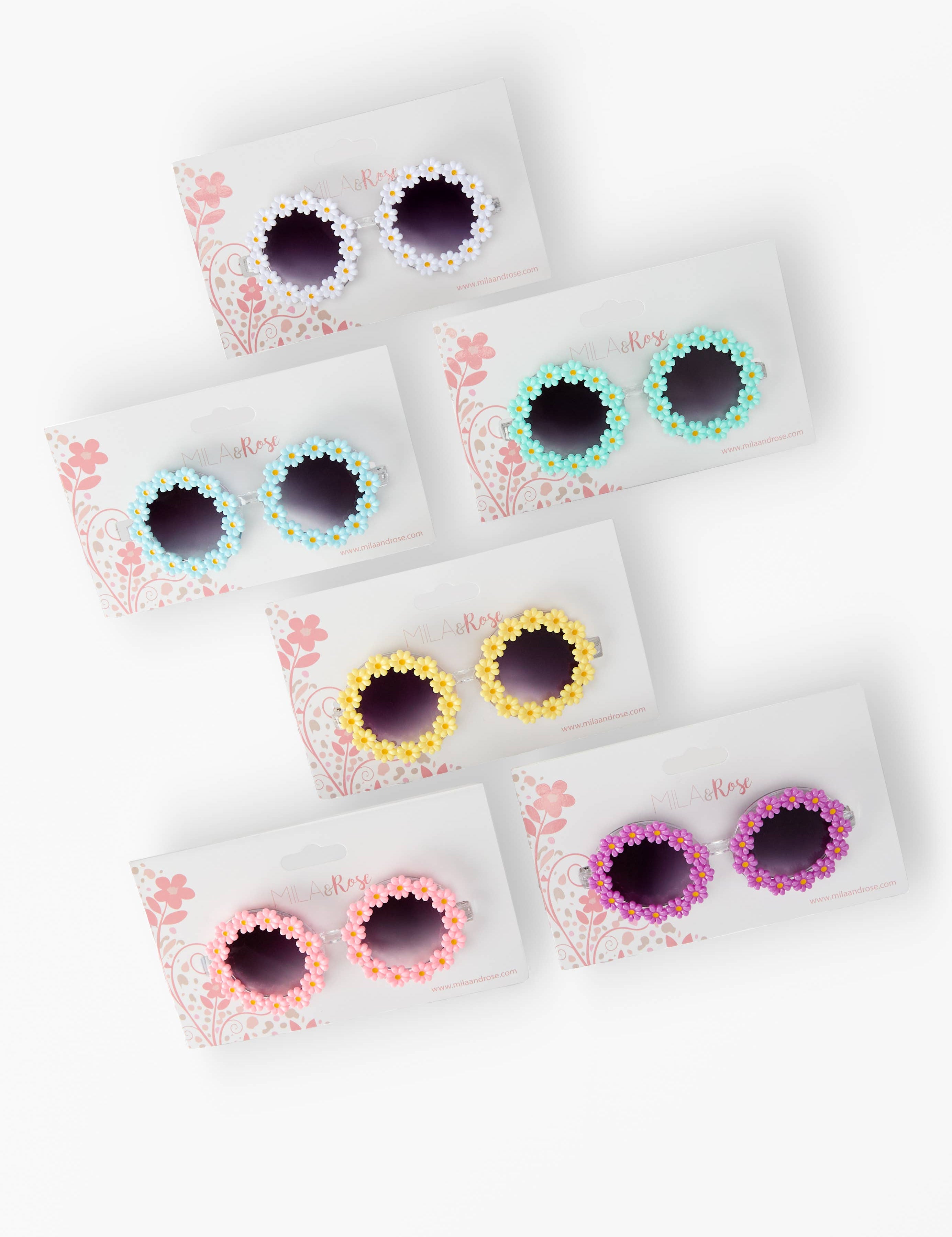 Toddler and young girls daisy sunglasses with floral frames in assorted colors, lightweight and playful design – JSQ Mercantile – a women’s boutique and gift shop in La Grange, IL.