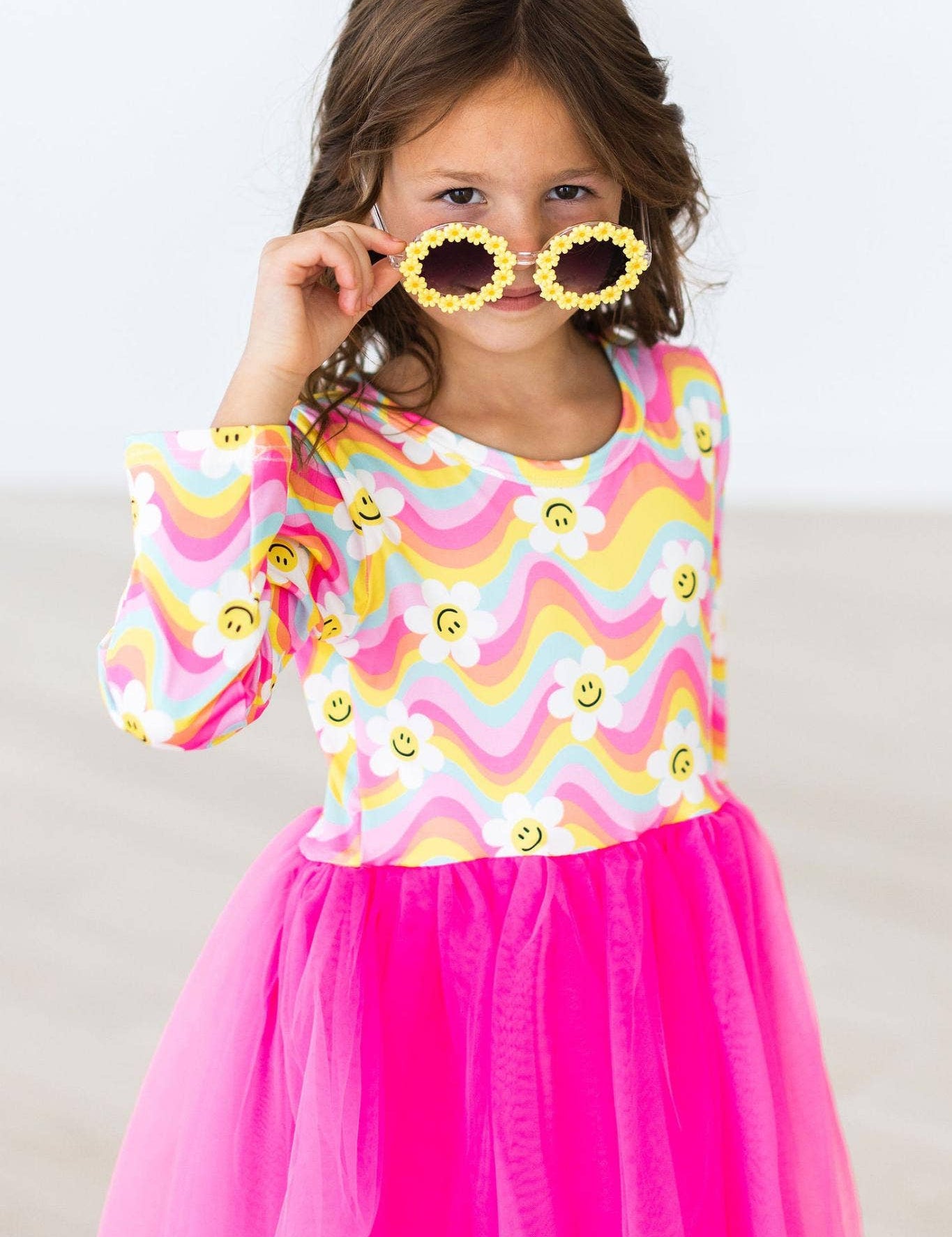 Toddler and young girls daisy sunglasses with floral frames in assorted colors, lightweight and playful design – JSQ Mercantile – a women’s boutique and gift shop in La Grange, IL.