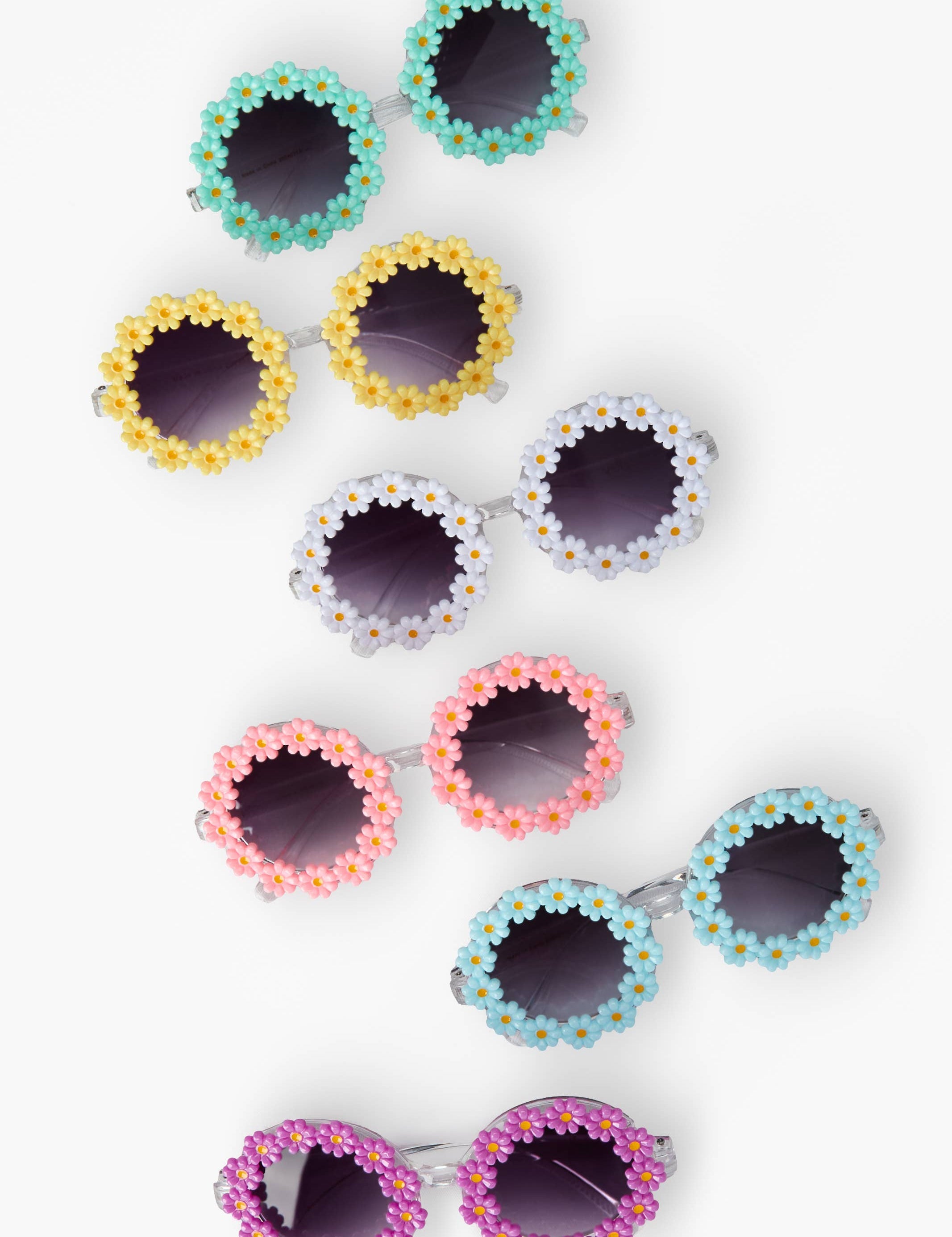 Toddler and young girls daisy sunglasses with floral frames in assorted colors, lightweight and playful design – JSQ Mercantile – a women’s boutique and gift shop in La Grange, IL.