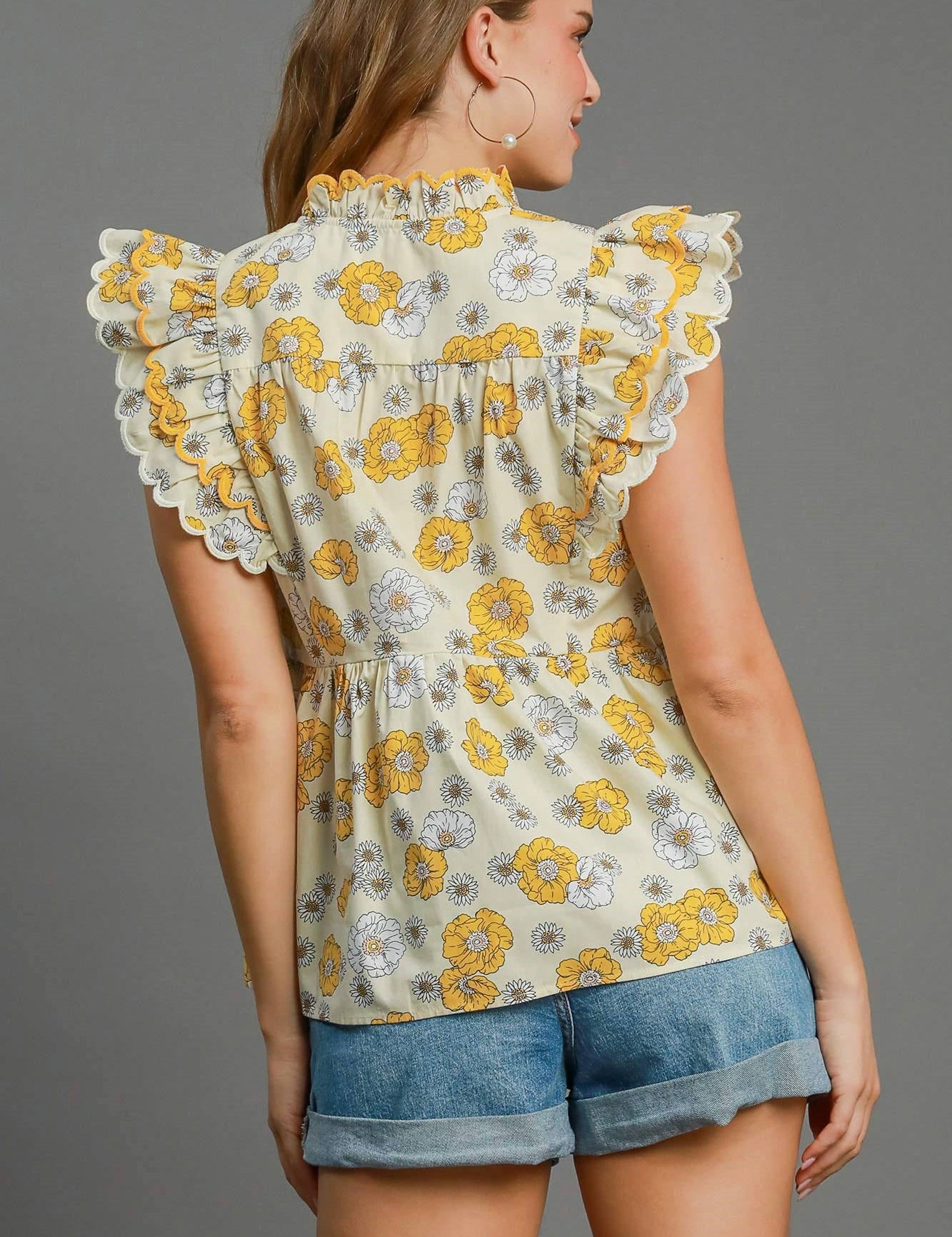 Floral print peplum top with scalloped sleeves and lined cotton fabric for women | JSQ Mercantile – a women’s boutique and gift shop in La Grange, IL.