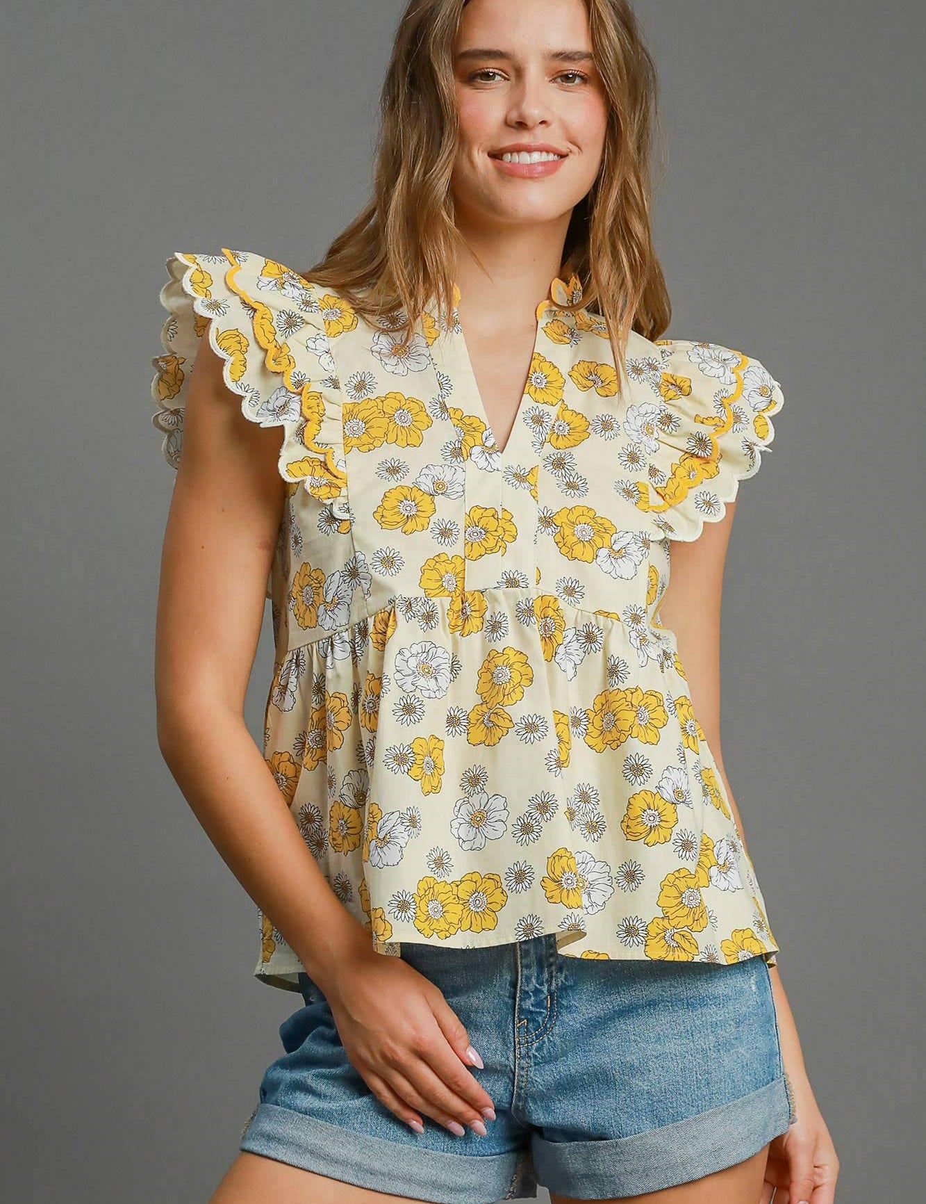 Floral print peplum top with scalloped sleeves and lined cotton fabric for women | JSQ Mercantile – a women’s boutique and gift shop in La Grange, IL.