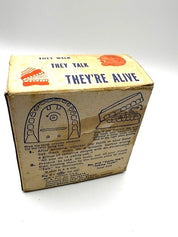 1949 Yakity-Yak #618 Talking Teeth in original box with key.