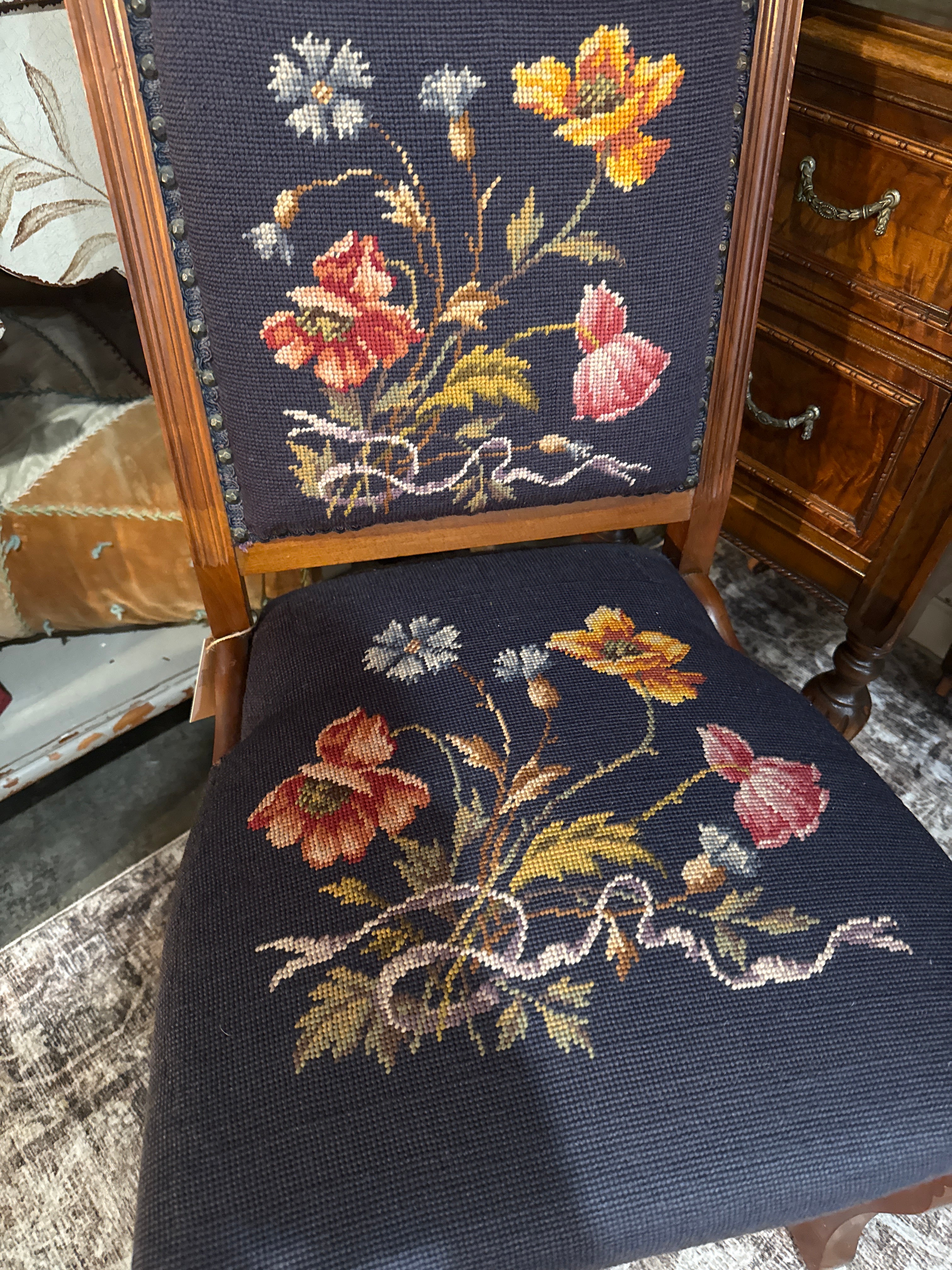 Antique Eastlake Blue floral needle point chair with front wheels