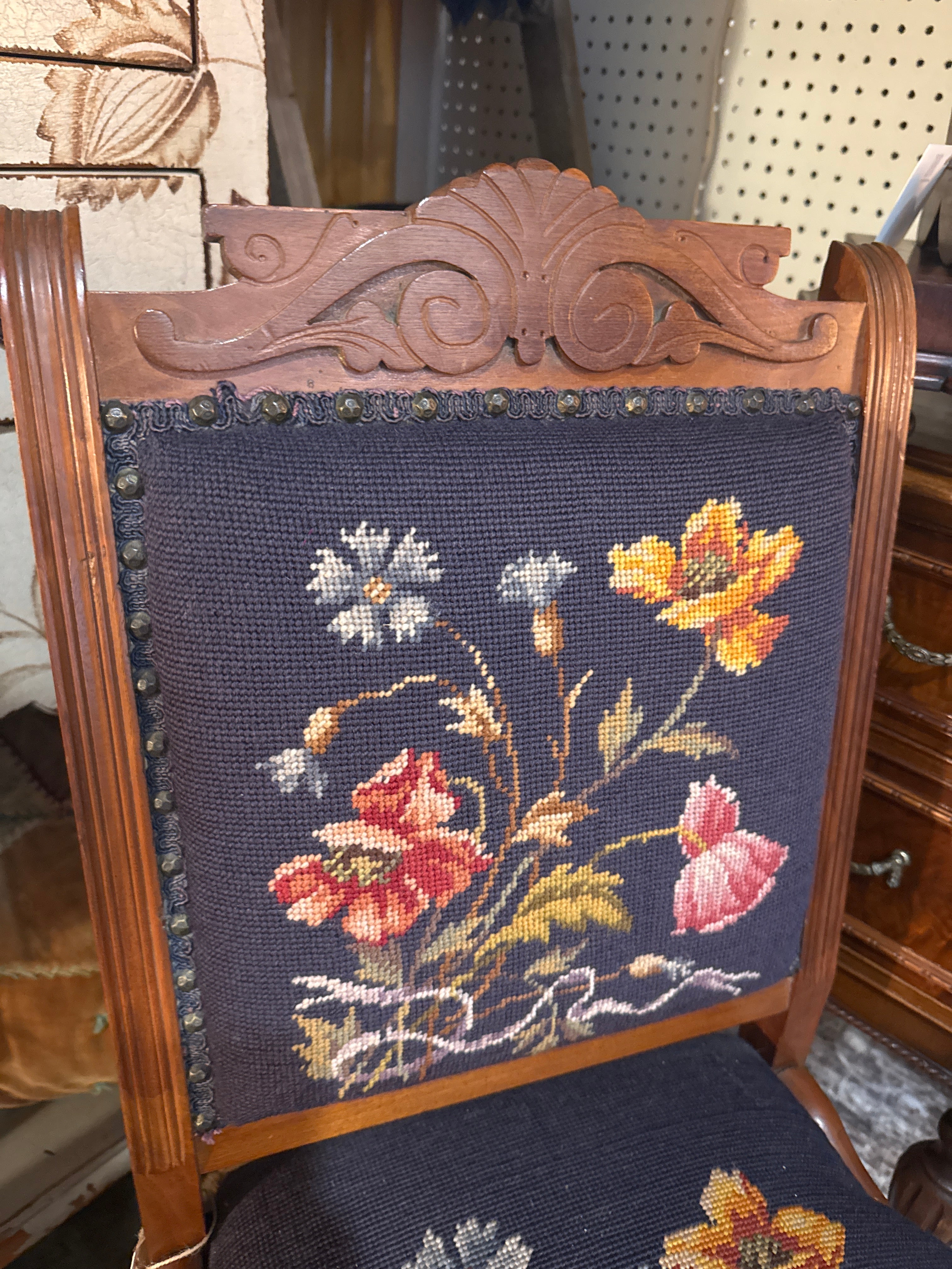 Antique Eastlake Blue floral needle point chair with front wheels