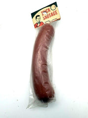1960's Dime Store "Trick Sausage" made in Hong Kong.  Package has never been opened.