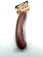 1960's Dime Store "Trick Sausage" made in Hong Kong.  Package has never been opened.
